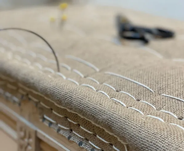 Reupholstered chair in the workshop